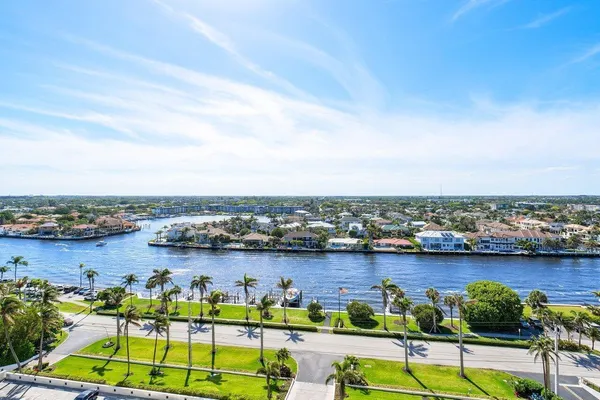 a bathroom with a toilet a sink and shower
