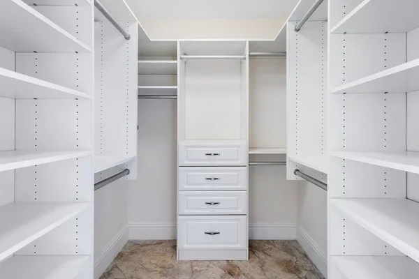 a view of a room with a large window