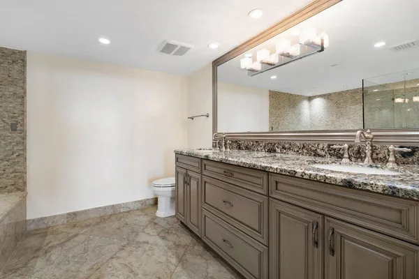 a view of a living room and floor to ceiling window
