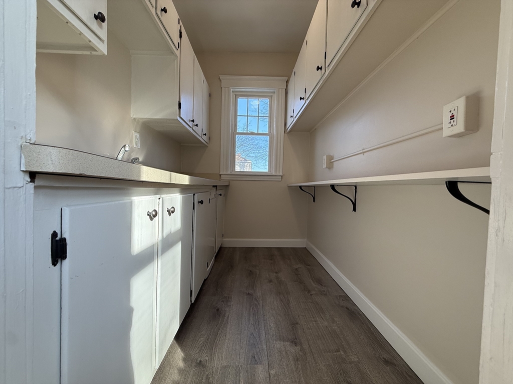 304 Lovell Street, Unit 2 Worcester, MA 01602 - Photo 12 of 13 a view of a hallway with wooden floors