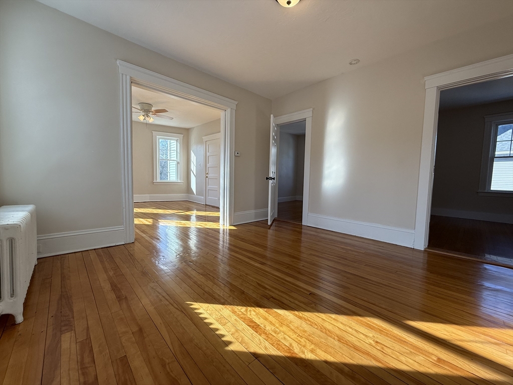 304 Lovell Street, Unit 2 Worcester, MA 01602 - Photo 5 of 13 a view of livingroom with hardwood