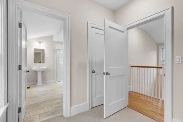 a view of a bathroom with a glass door and shower
