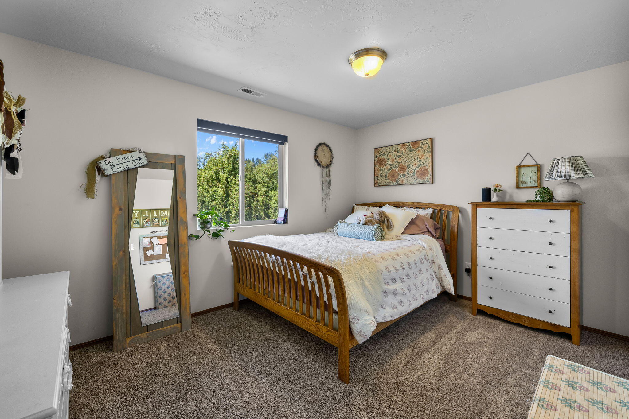 63639 Gentry Loop Bend, OR 97701 - Photo 27 of 40 a bedroom with a bed and a window