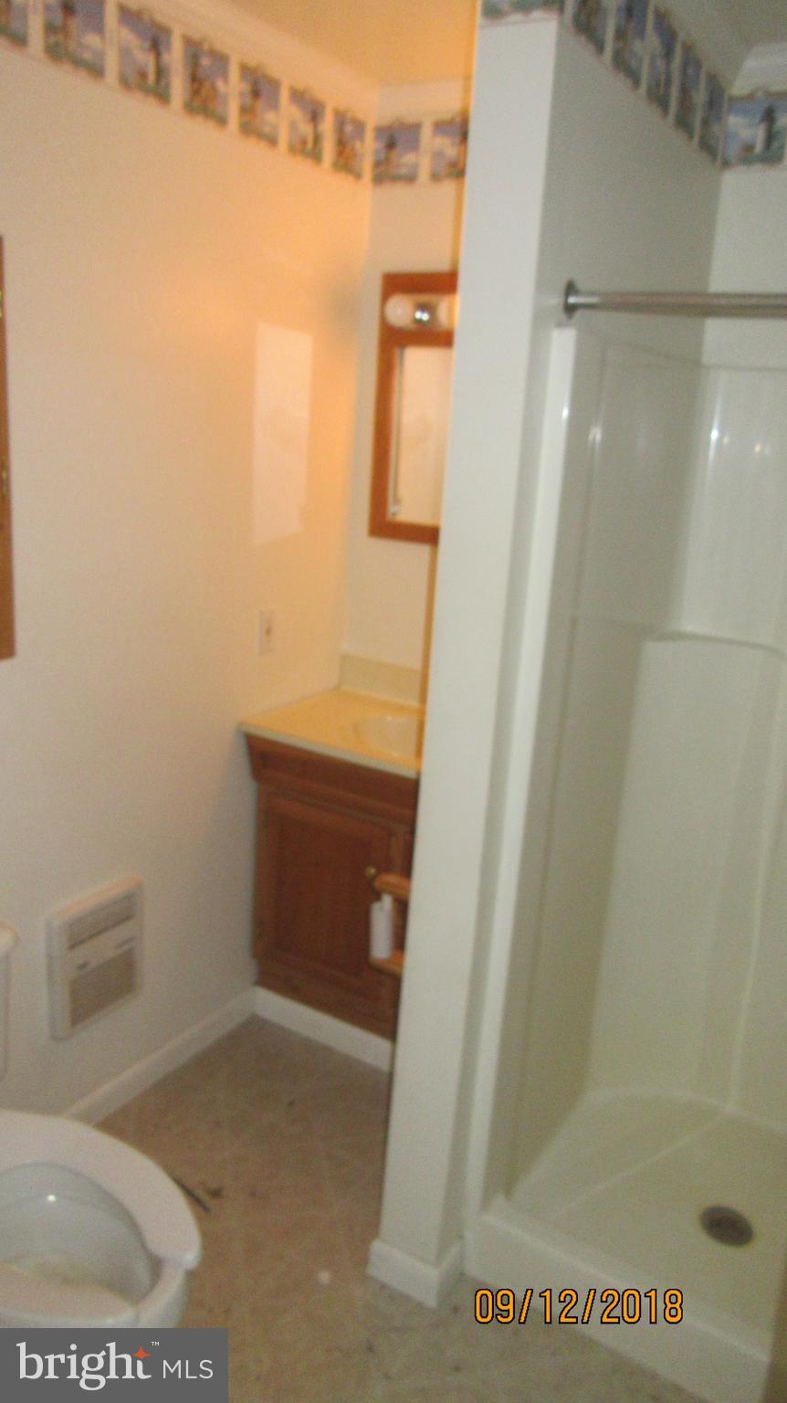 114 Woods Road Chester, MD 21619 - Photo 19 of 24 Bathroom off of kitchen