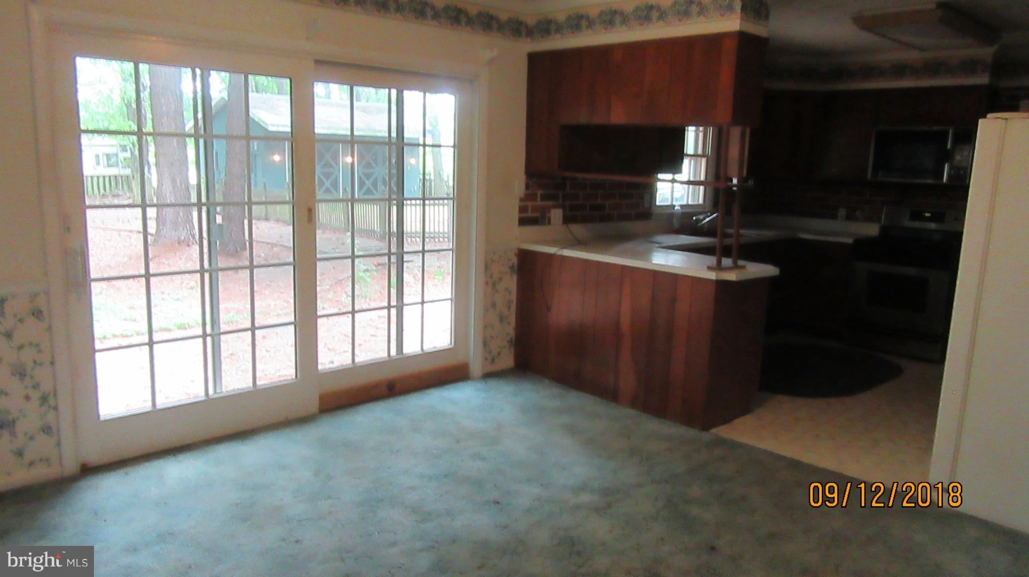 114 Woods Road Chester, MD 21619 - Photo 9 of 24 French Doors leading to Rear Yard