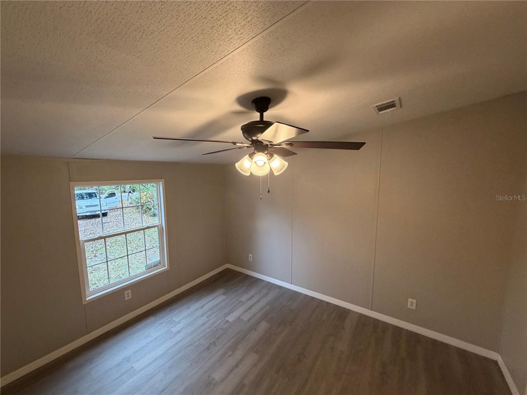 212 Paradise Shores Road Crescent City, FL 32112 - Photo 13 of 23 a window in an empty room