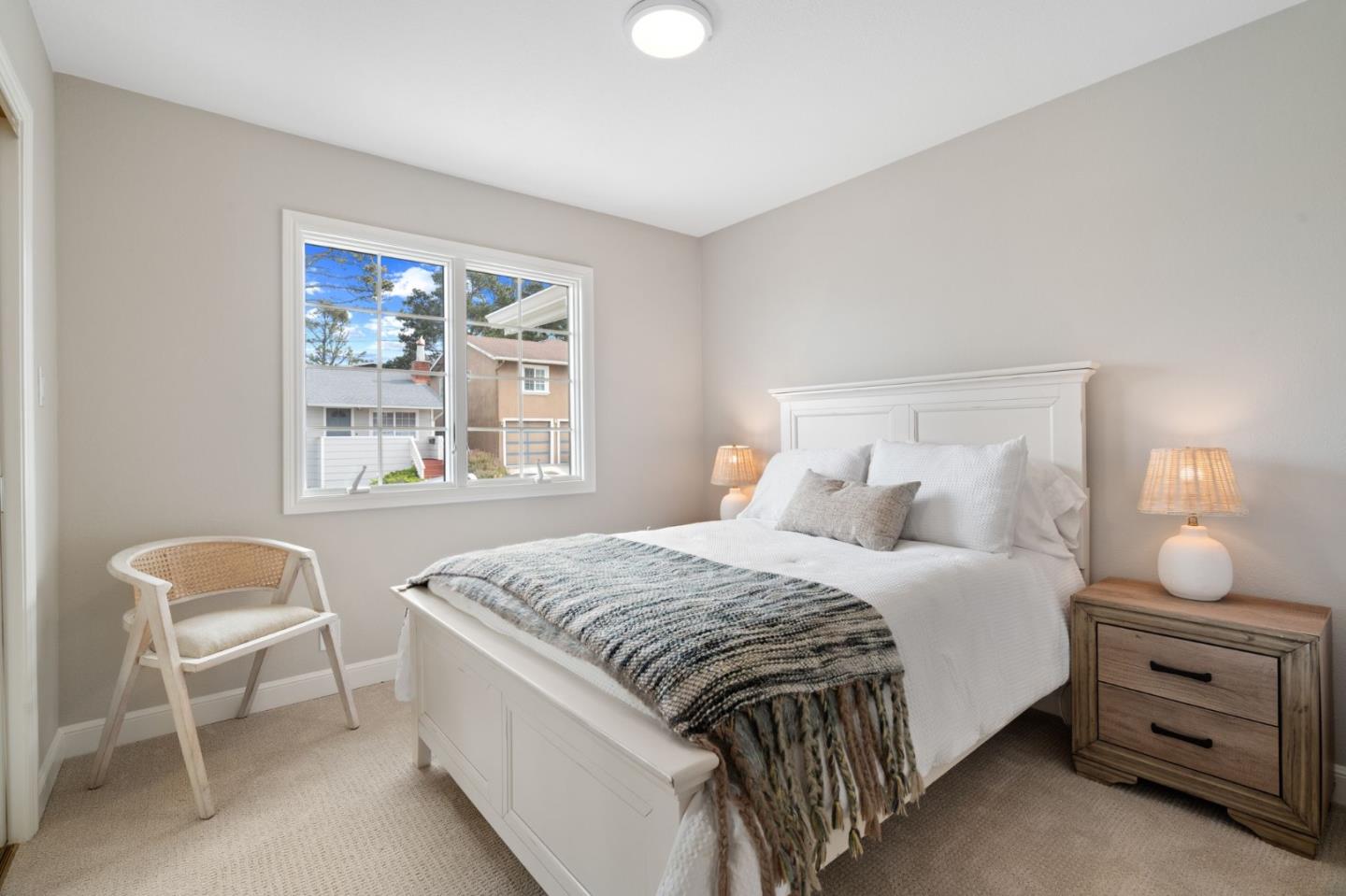 3901 Coronado Way San Bruno, CA 94066 - Photo 14 of 31 a bedroom with a bed and a window