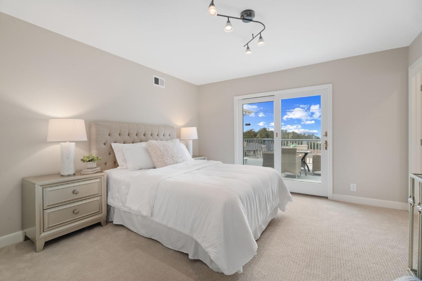 3901 Coronado Way San Bruno, CA 94066 - Photo 19 of 31 a bedroom with a bed and a window