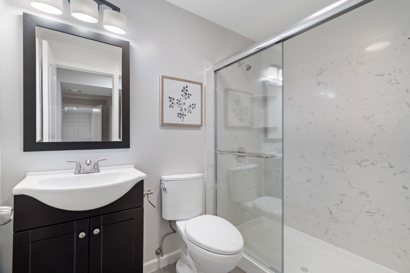 3901 Coronado Way San Bruno, CA 94066 - Photo 27 of 31 a bathroom with a sink a toilet and shower