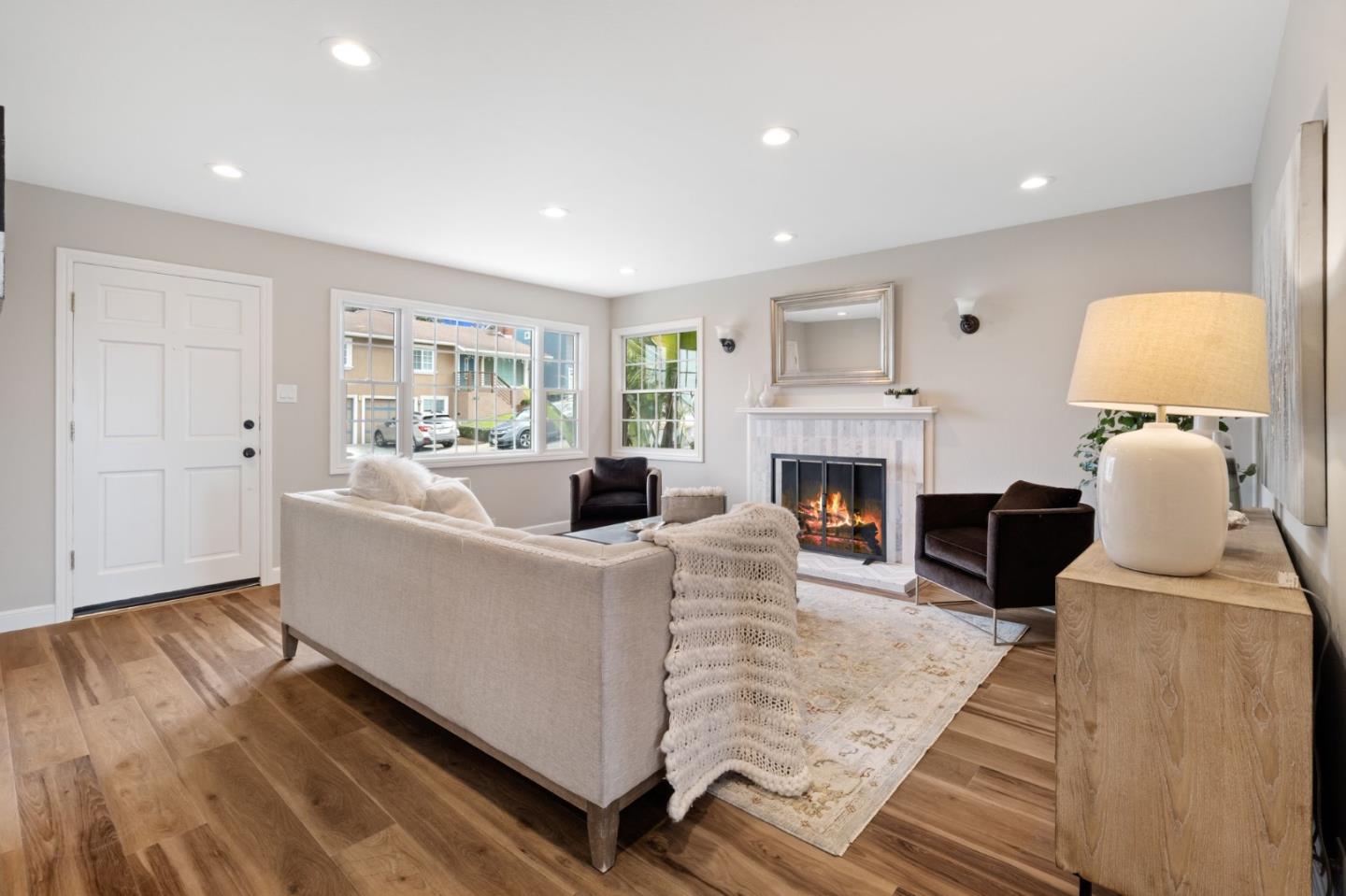 3901 Coronado Way San Bruno, CA 94066 - Photo 6 of 31 a living room with furniture and a fireplace