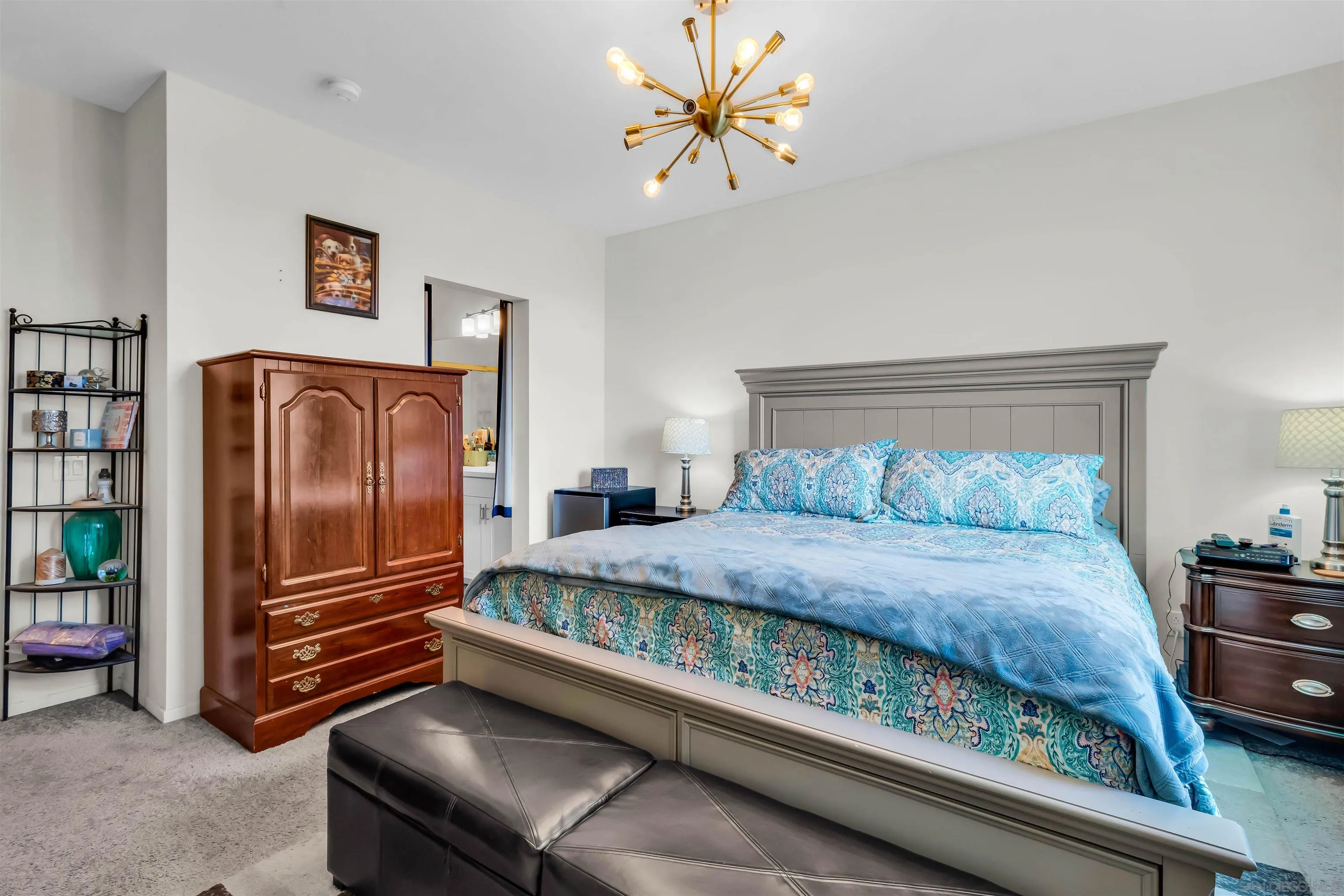 5515 San Roberto San Diego, CA 92154 - Photo 20 of 27 a bedroom with a bed and a refrigerator