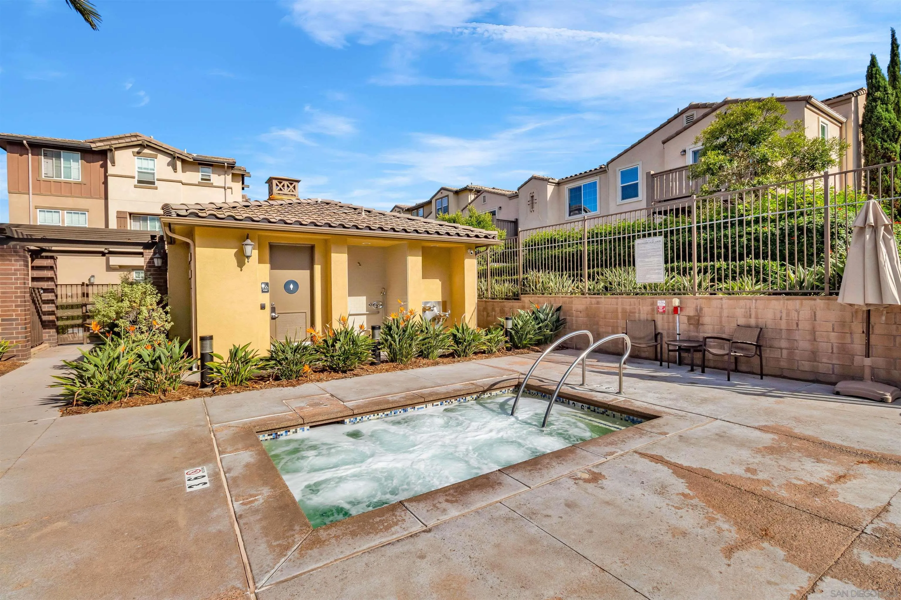 5515 San Roberto San Diego, CA 92154 - Photo 24 of 27 a front view of a house with a garden