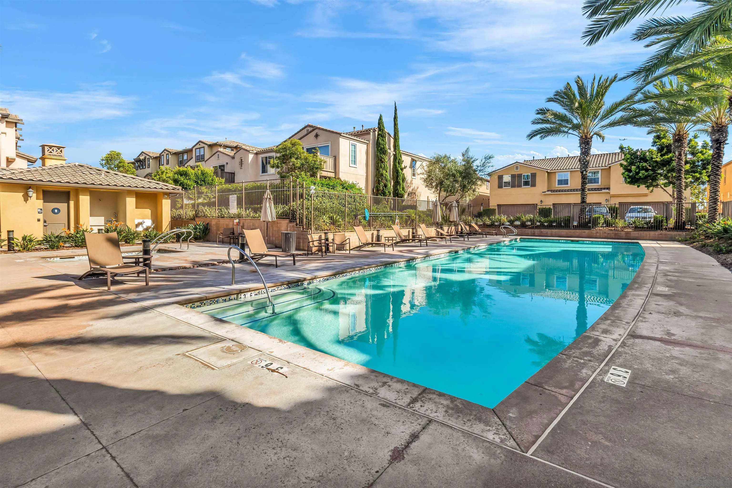 5515 San Roberto San Diego, CA 92154 - Photo 25 of 27 a view of a lake with a building and a big yard