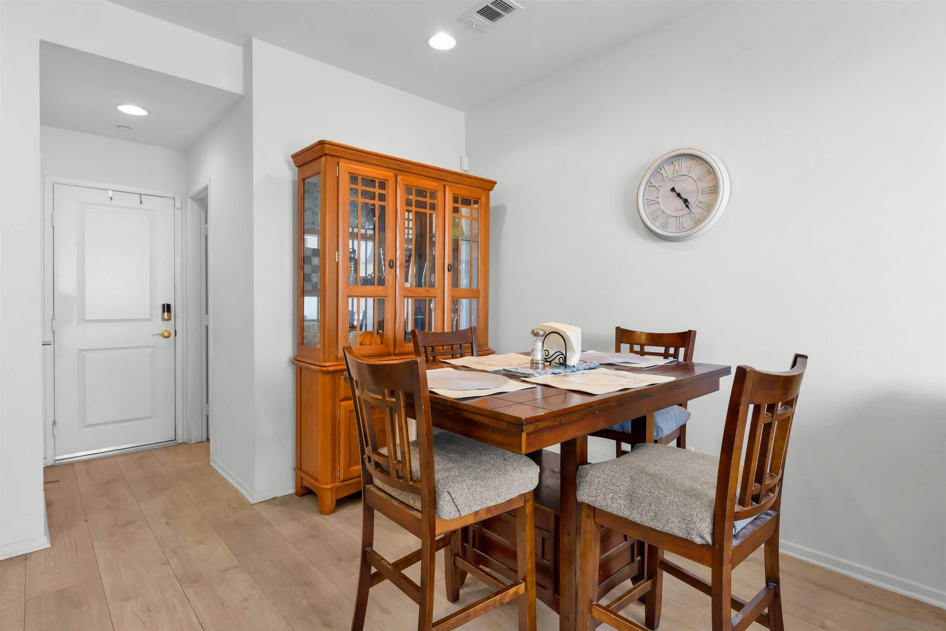 5515 San Roberto San Diego, CA 92154 - Photo 5 of 27 a table and chairs in a room