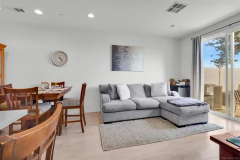 a living room with furniture and a table