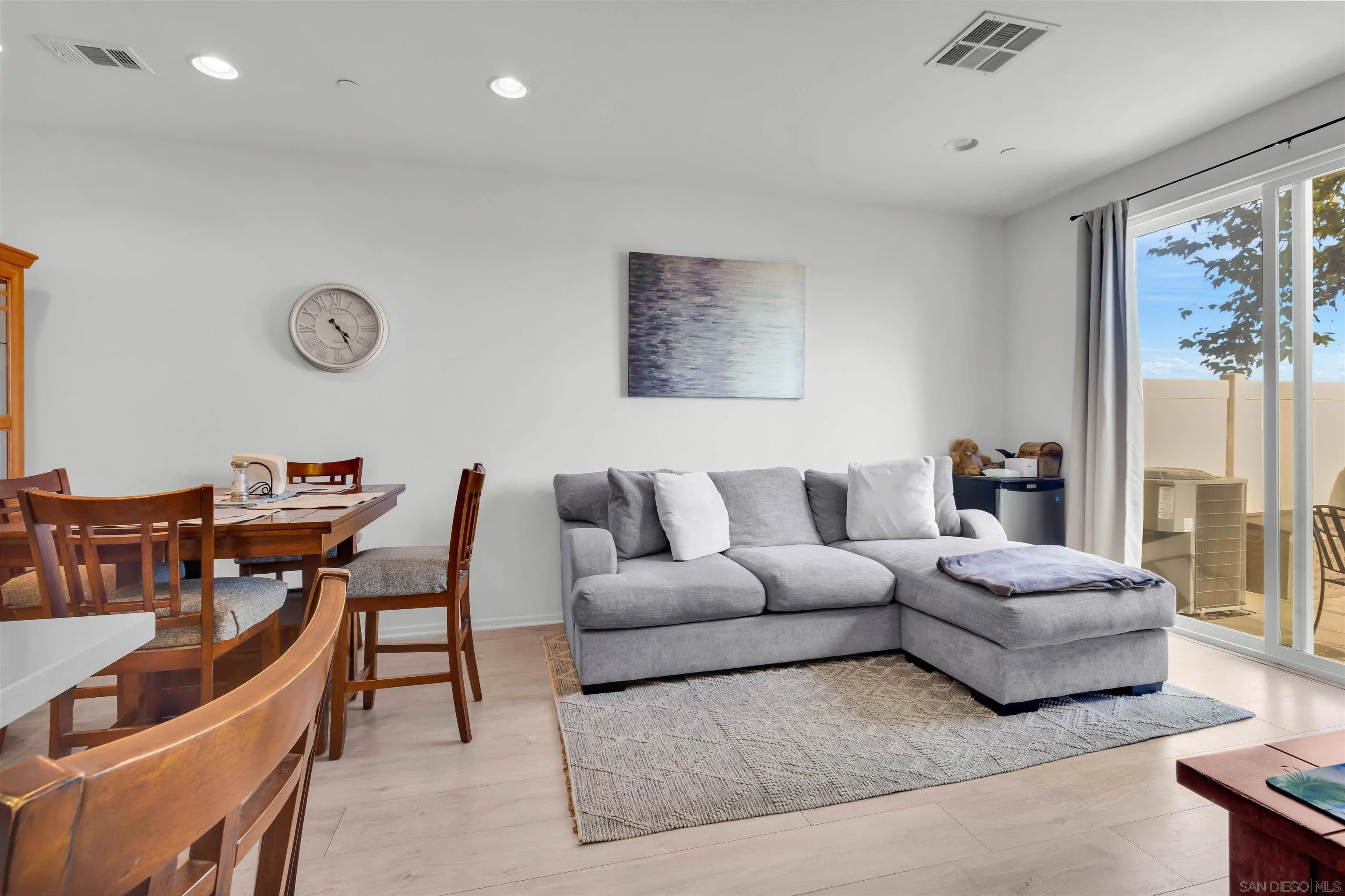 5515 San Roberto San Diego, CA 92154 - Photo 6 of 27 a living room with furniture and a table