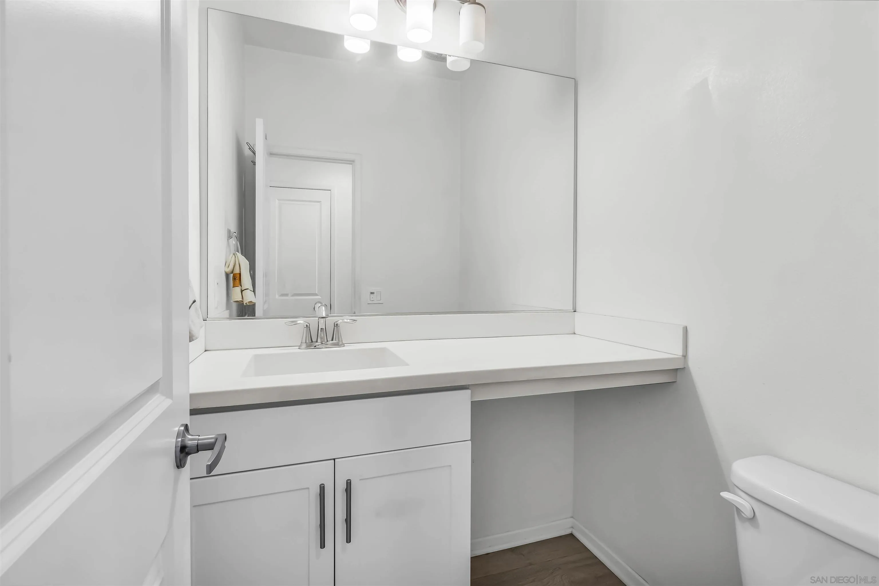 5515 San Roberto San Diego, CA 92154 - Photo 10 of 27 a bathroom with a sink and a toilet