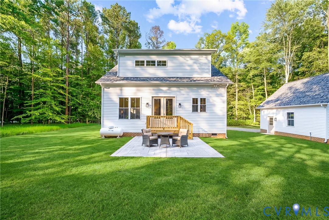 8299 Pamlico Road Ashland, VA 23005 - Photo 32 of 35 a view of a house with a yard porch and sitting area