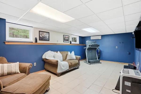 a bedroom with furniture and a couch