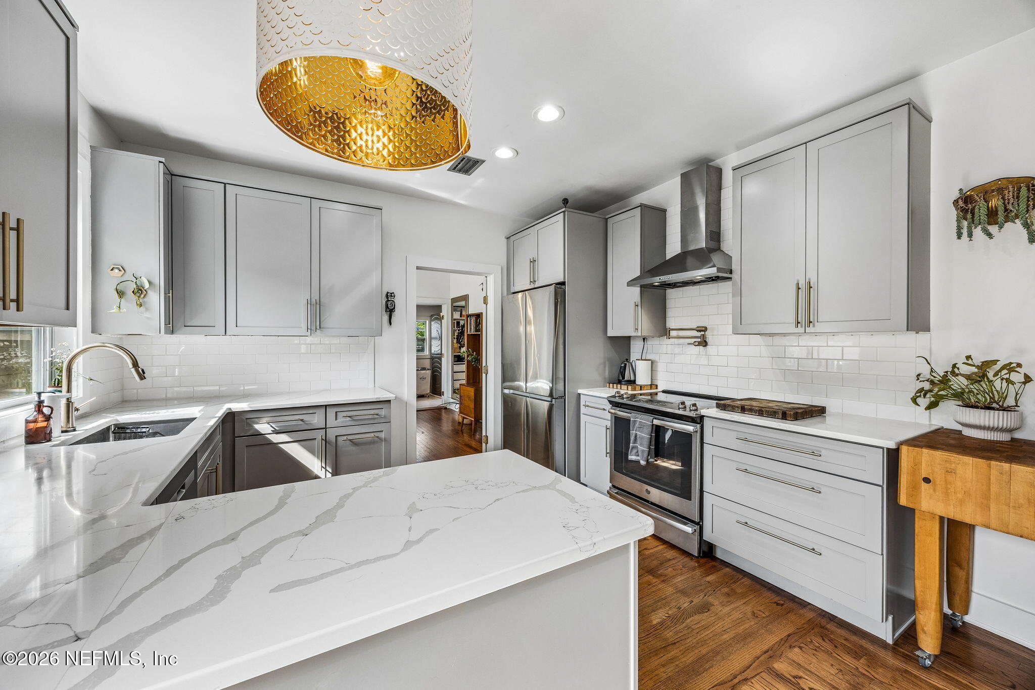 4713 French Street Jacksonville, FL 32205 - Photo 19 of 74 a kitchen with granite countertop a sink stainless steel appliances and cabinets