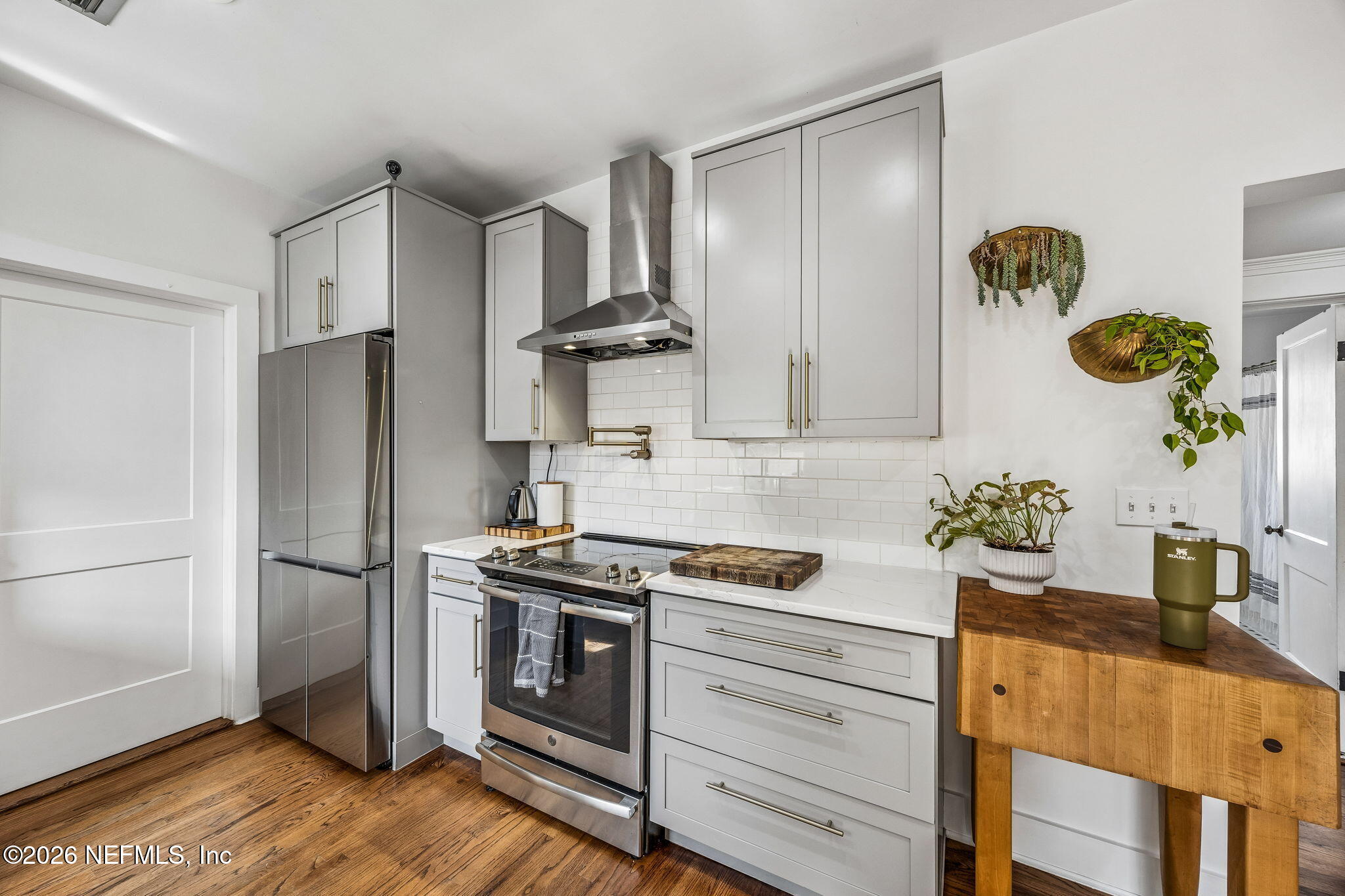 4713 French Street Jacksonville, FL 32205 - Photo 22 of 74 a kitchen with stainless steel appliances granite countertop a refrigerator and a stove