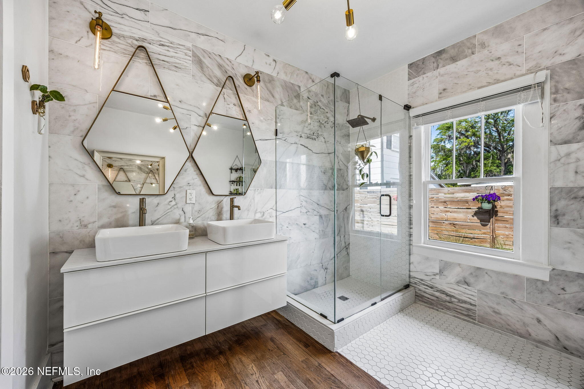 4713 French Street Jacksonville, FL 32205 - Photo 27 of 74 a view of bathroom with a tub sink and mirror