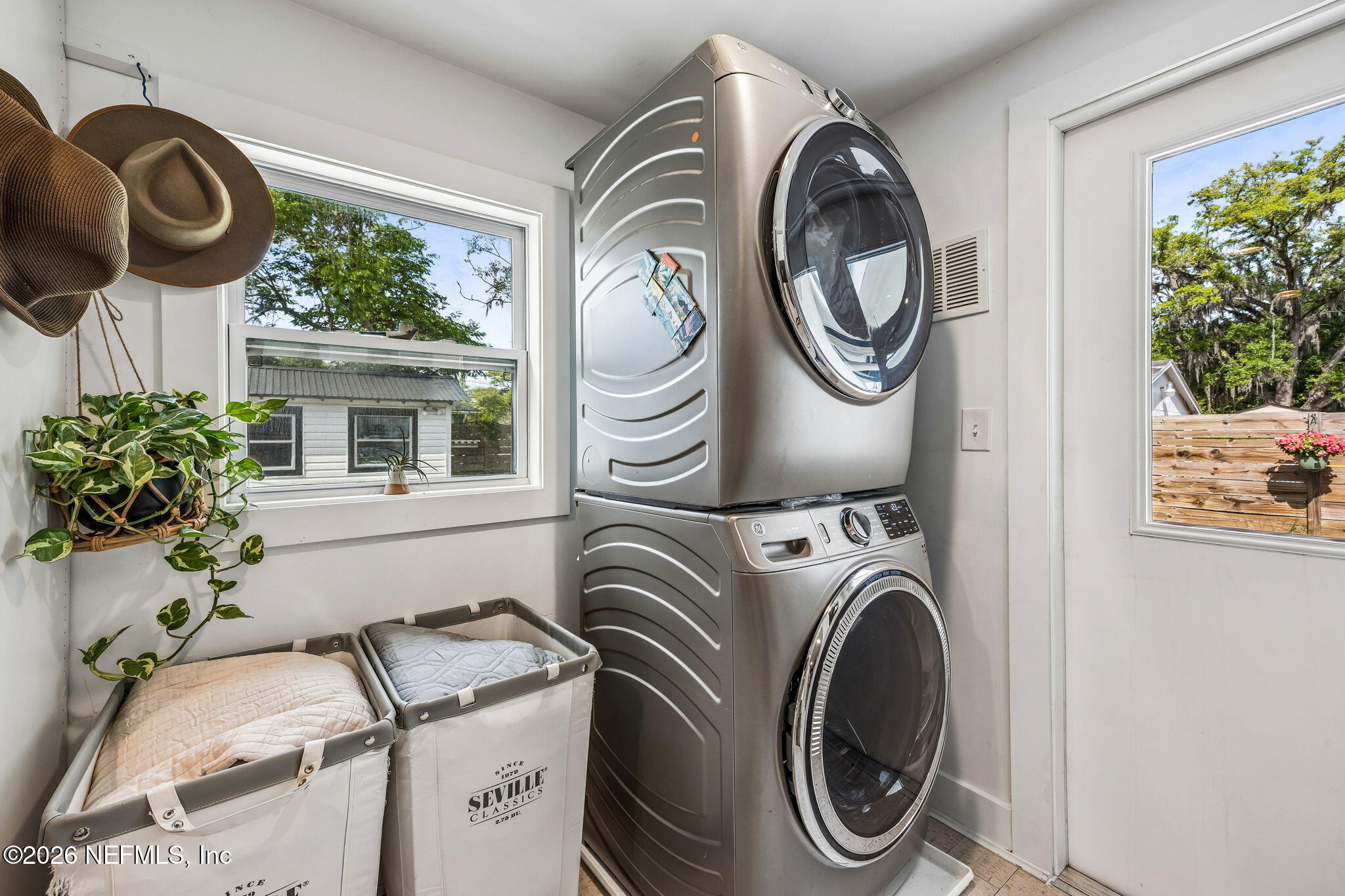 4713 French Street Jacksonville, FL 32205 - Photo 36 of 74 a utility room with dryer and washer