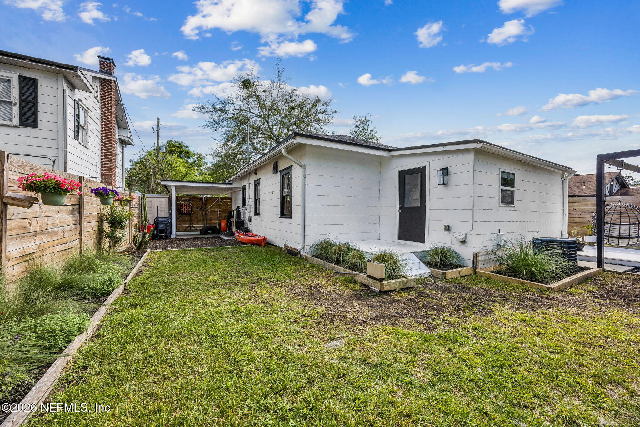 4713 French Street Jacksonville, FL 32205 - Photo 47 of 74 a backyard of a house with table and chairs