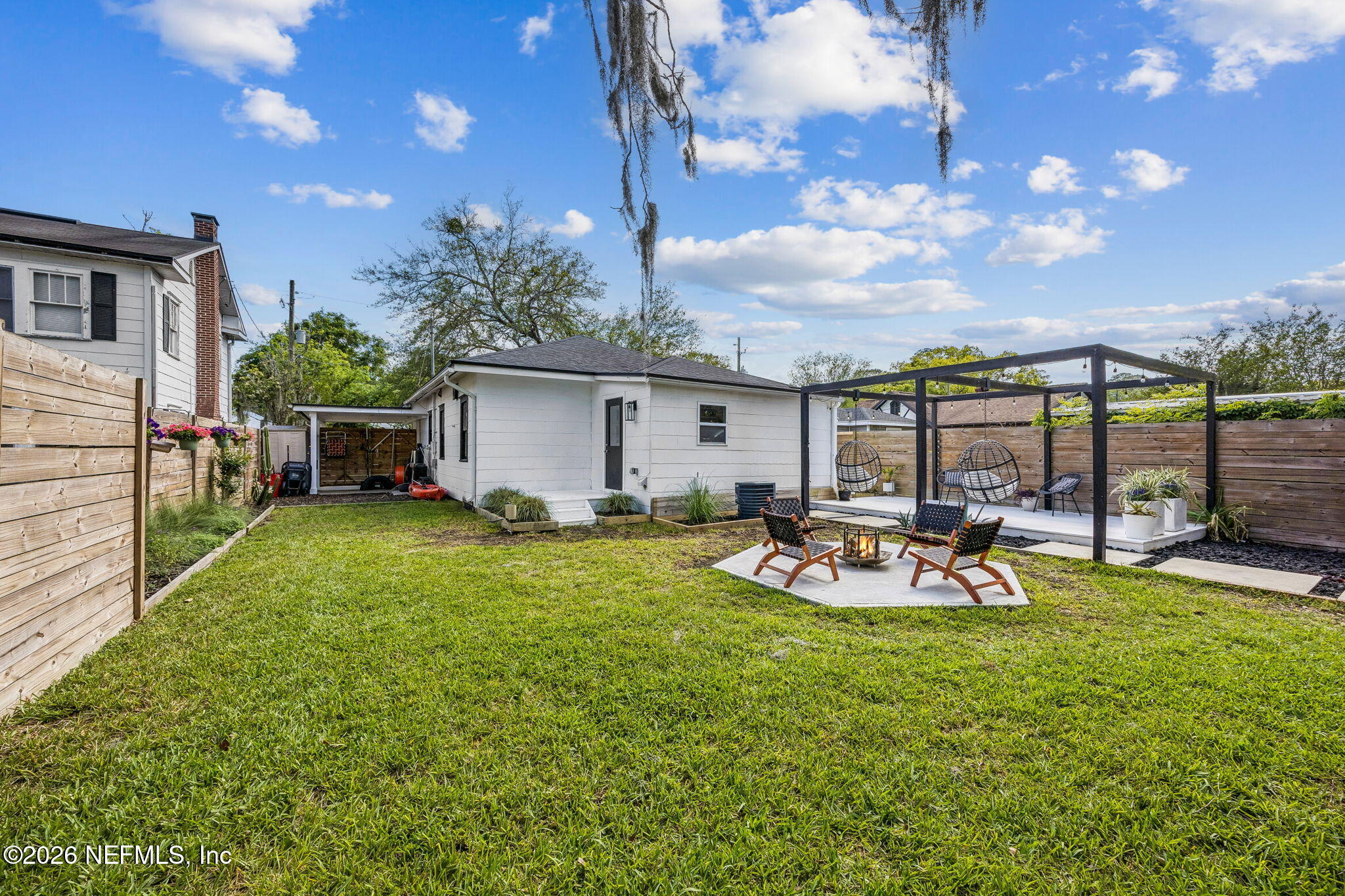 4713 French Street Jacksonville, FL 32205 - Photo 48 of 74 a view of a house with backyard sitting area and garden