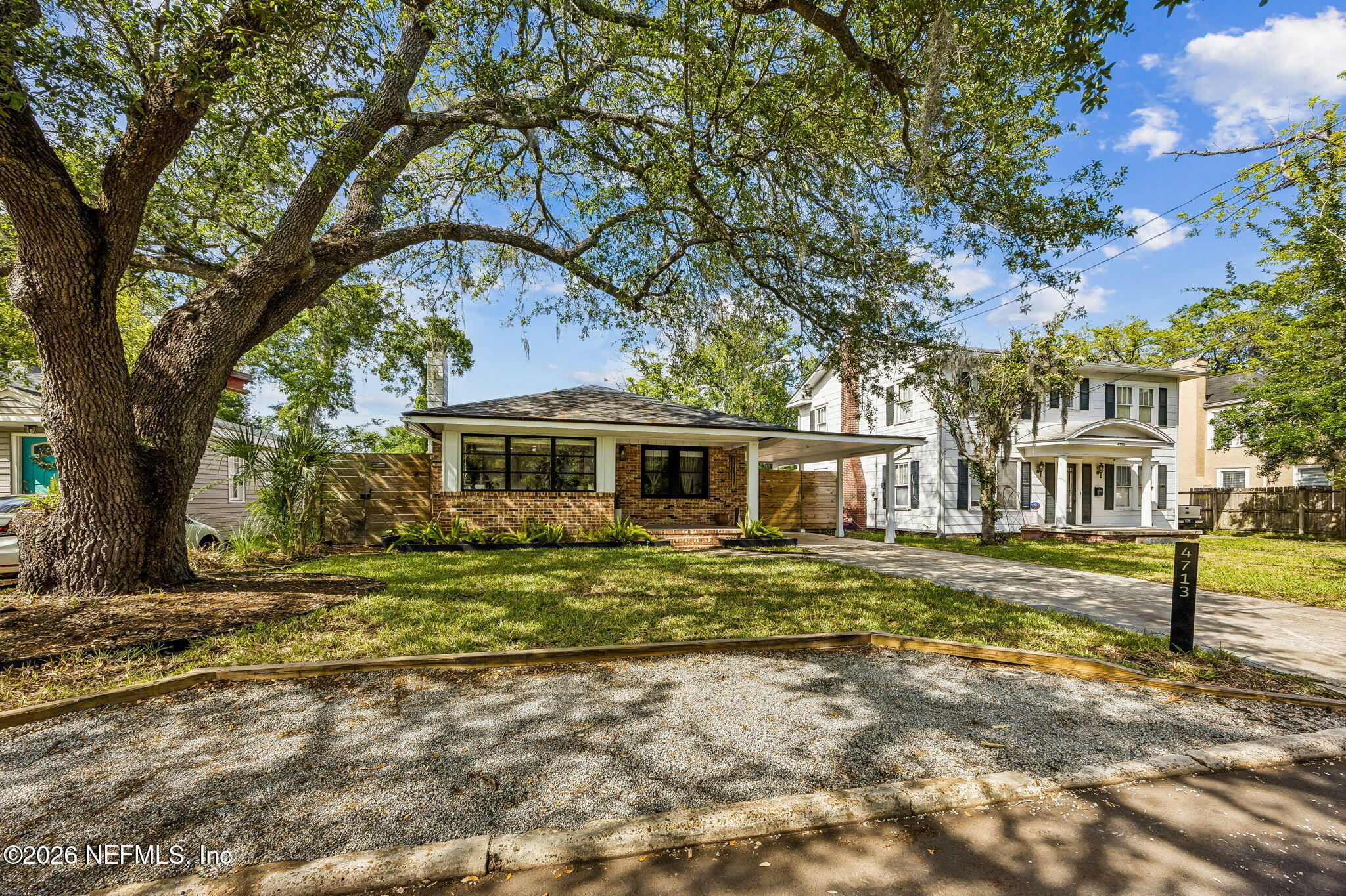 4713 French Street Jacksonville, FL 32205 - Photo 5 of 74 a front view of a house with a garden