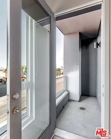 a view of walk in closet with window