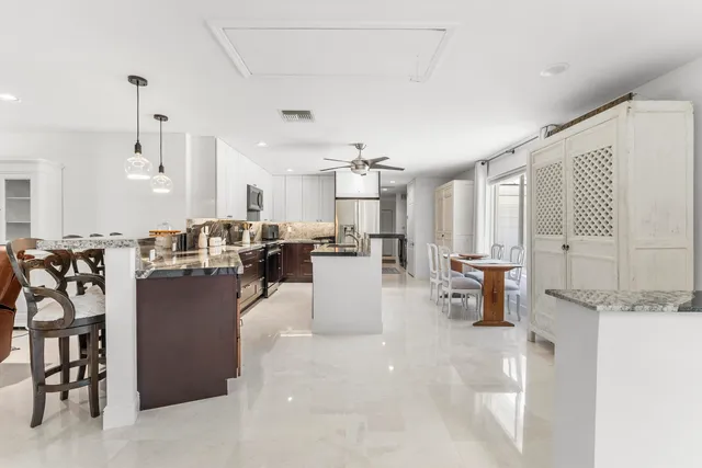 a view of a swimming pool and an outdoor space