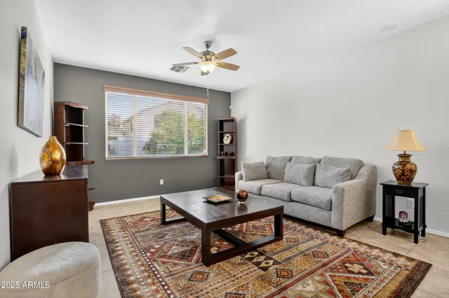 a view of a house with a yard and garage