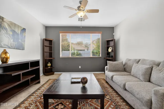 a view of a house with swimming pool and a yard