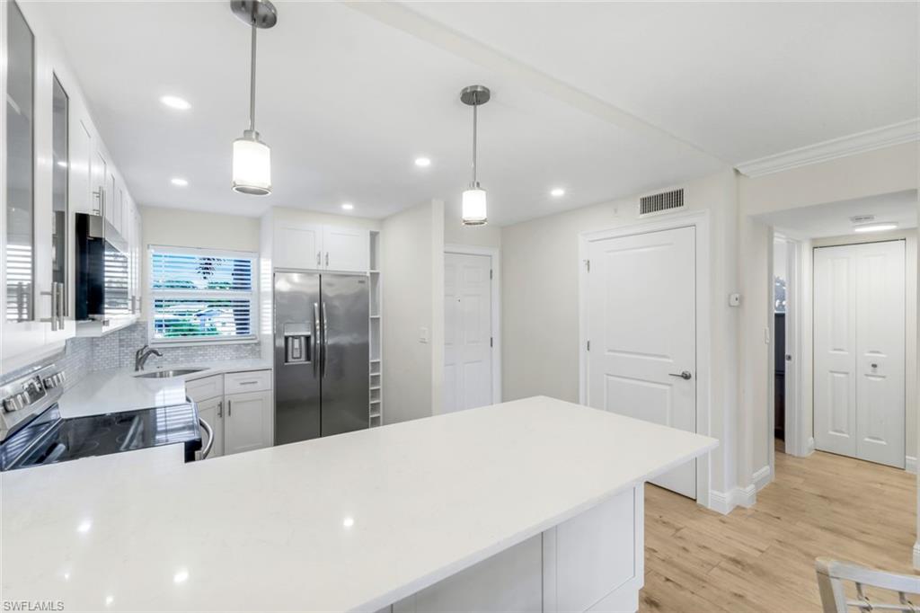 9 High Point Circle North, Unit 208 Naples, FL 34103 - Photo 10 of 37