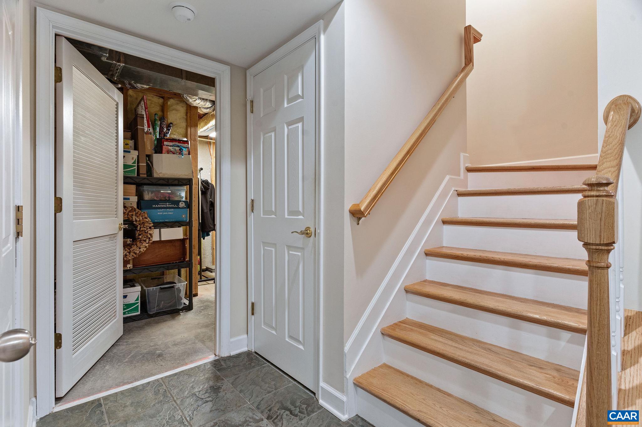 1286 Chatham Ridge Charlottesville, VA 22901 - Photo 8 of 33 a view of staircase with white walls and windows