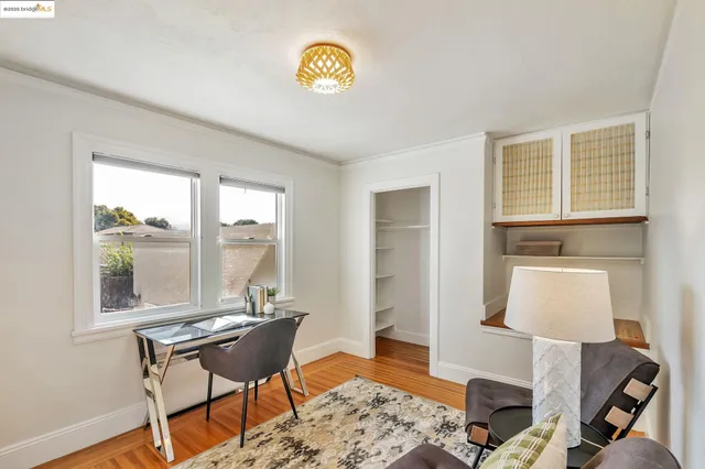 a workspace with furniture and a window