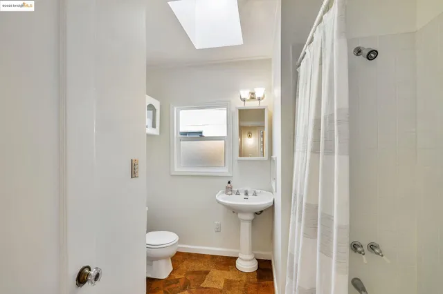 a bathroom with a sink and a toilet