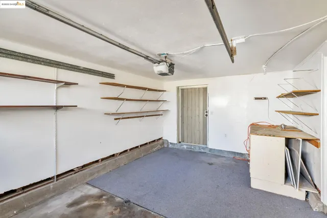 a view of a room with shelves
