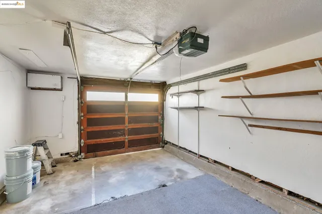 a view of a backyard with a patio