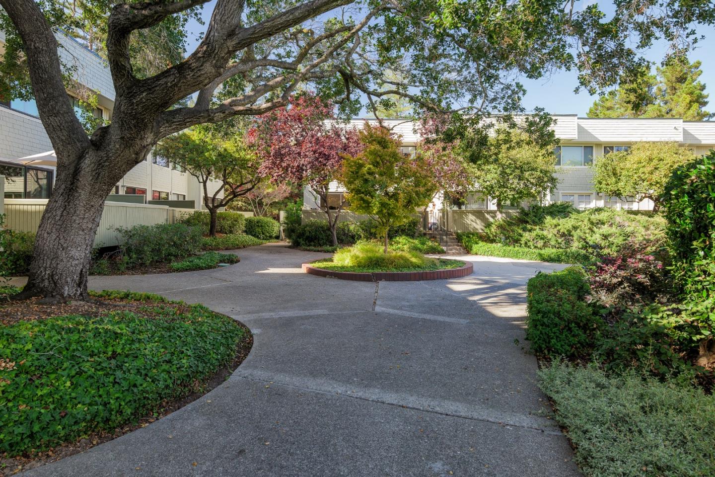 2313 Sharon Road Menlo Park, CA 94025 - Photo 1 of 29 a view of a street with a tree in the garden