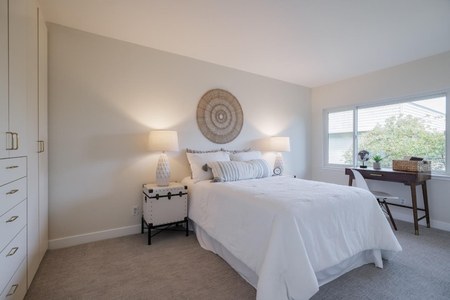 2313 Sharon Road Menlo Park, CA 94025 - Photo 14 of 29 a bedroom with a bed and a large window