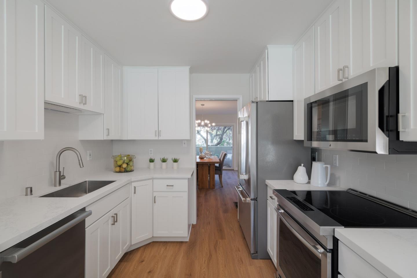 2313 Sharon Road Menlo Park, CA 94025 - Photo 2 of 29 a kitchen with a sink stove and refrigerator