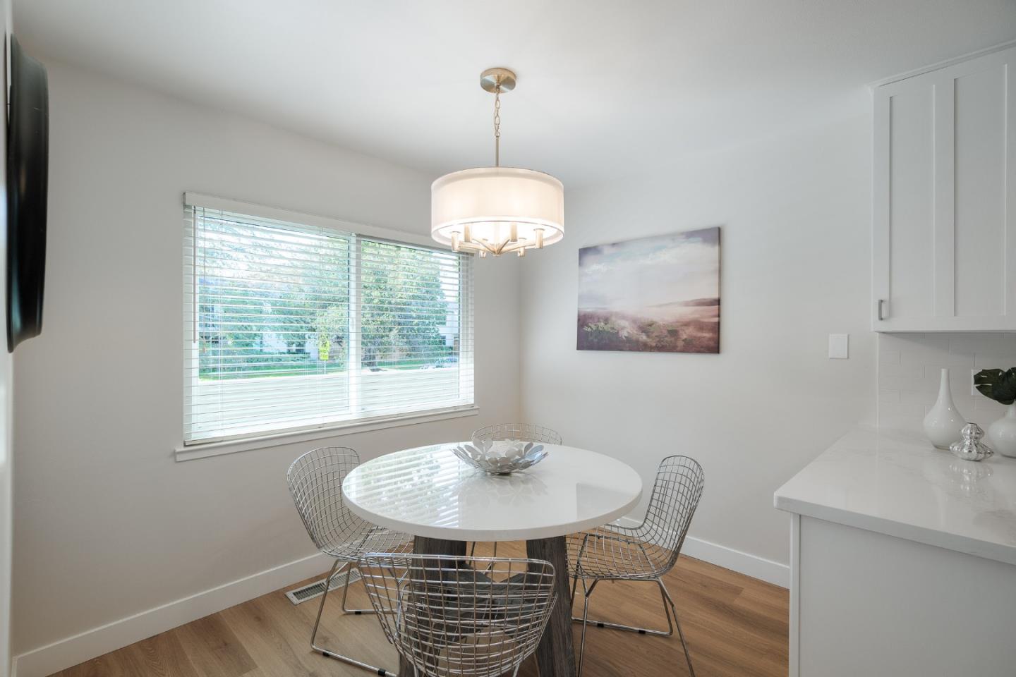 2313 Sharon Road Menlo Park, CA 94025 - Photo 5 of 29 a view of a dining room with furniture window and outside view