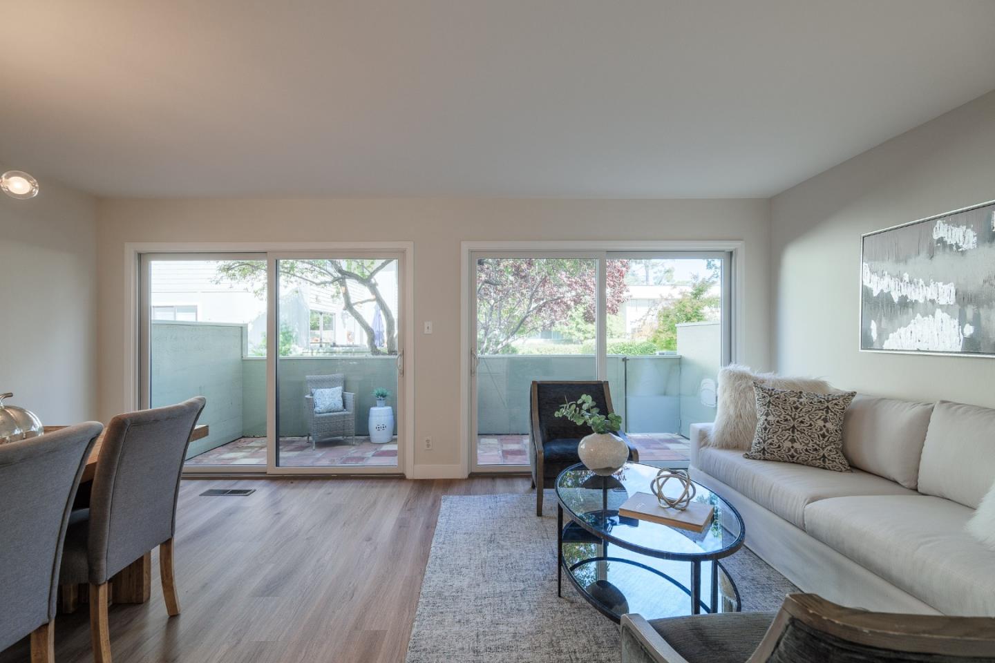 2313 Sharon Road Menlo Park, CA 94025 - Photo 7 of 29 a living room with furniture and a large window