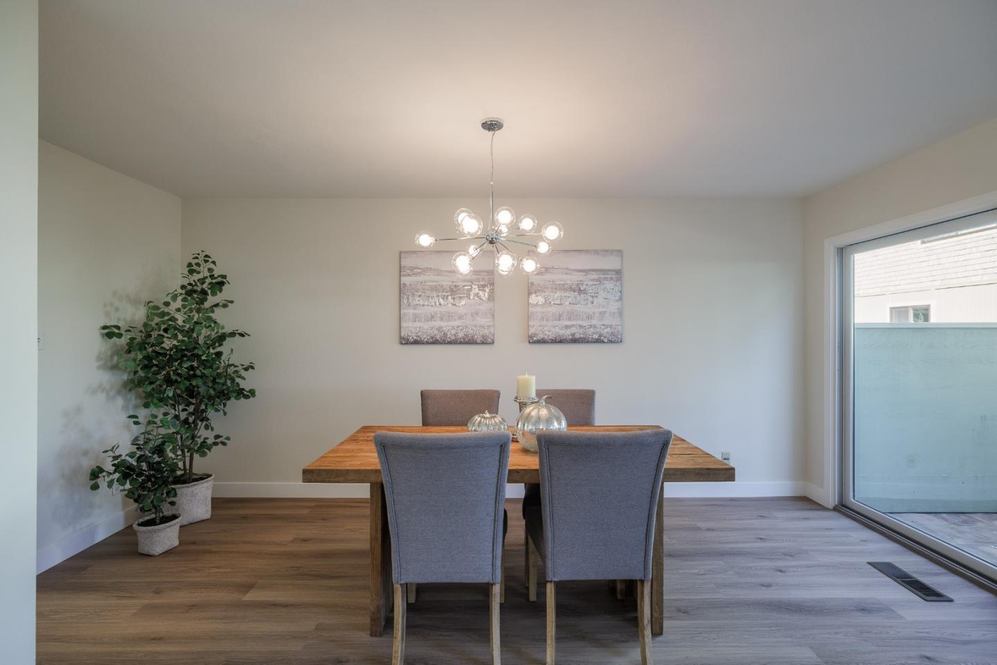 2313 Sharon Road Menlo Park, CA 94025 - Photo 9 of 29 a view of a dining room with furniture window and wooden floor