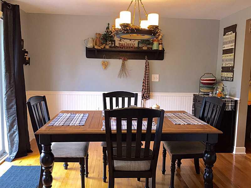 939 Linden Road Eighty Four, PA 15330 - Photo 4 of 24 Dining Room. Dining room with hardwood floors, chair rail