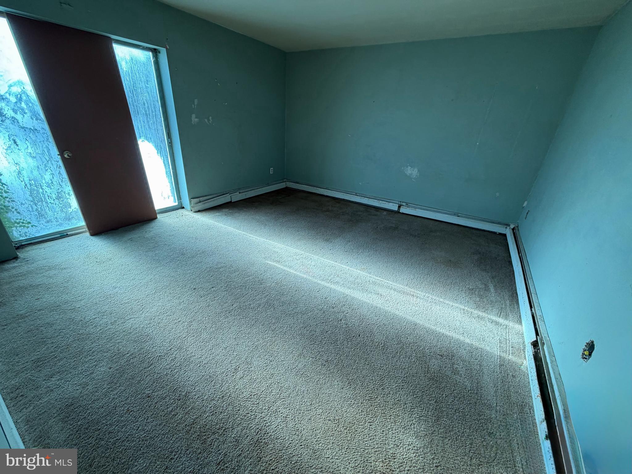 318 Marienstein Road Upper Black Eddy, PA 18972 - Photo 11 of 14 an empty room with a window