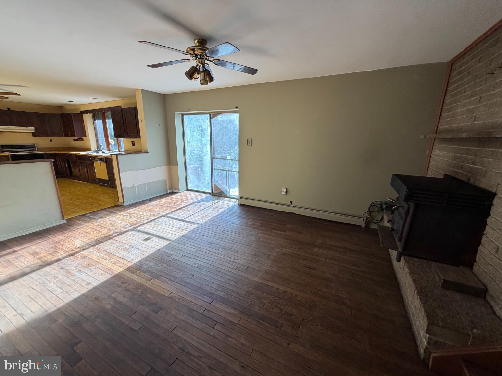 318 Marienstein Road Upper Black Eddy, PA 18972 - Photo 2 of 14 wooden floor in an empty room with a window