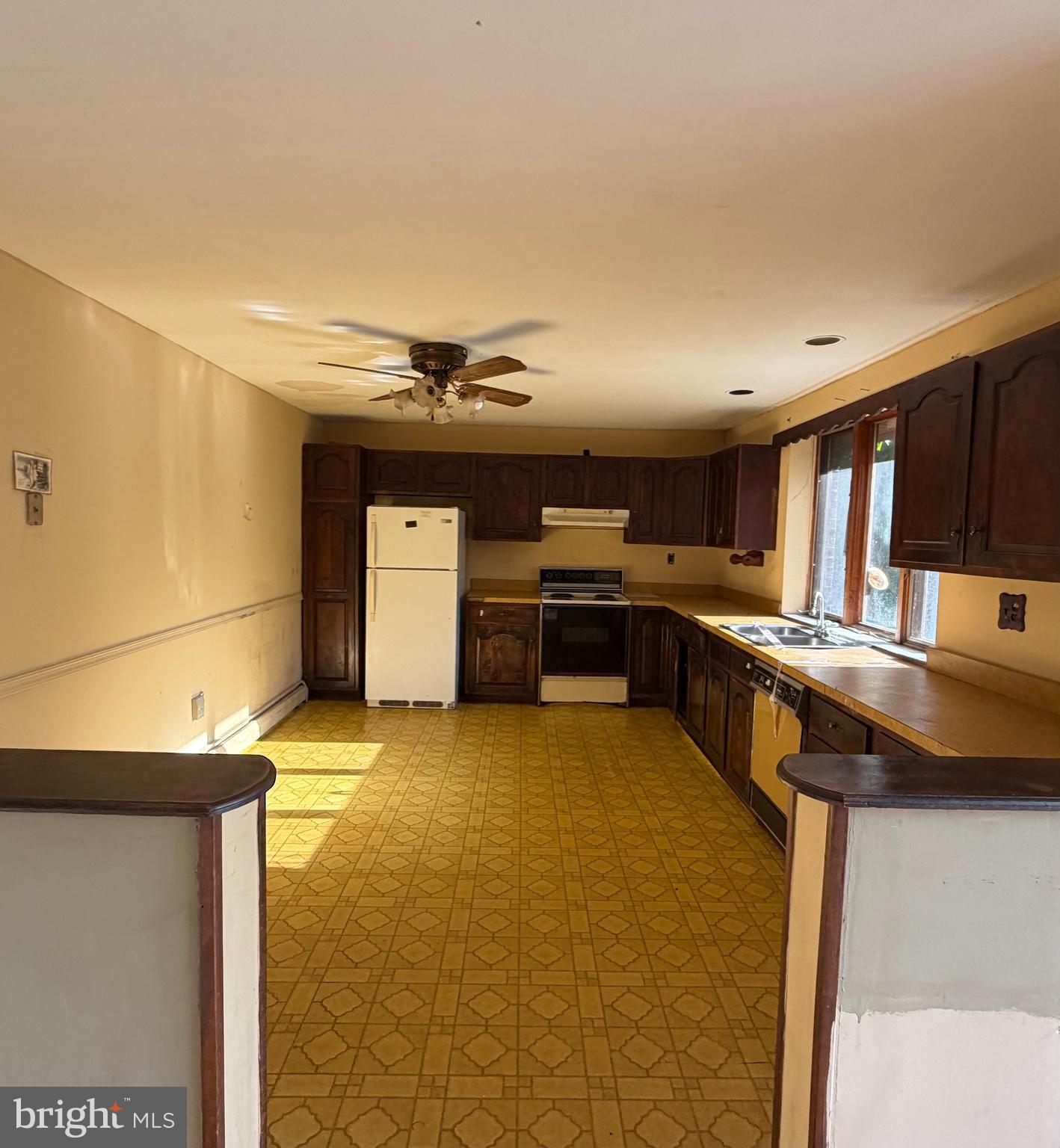 318 Marienstein Road Upper Black Eddy, PA 18972 - Photo 3 of 14 a kitchen with stainless steel appliances granite countertop a sink and stove